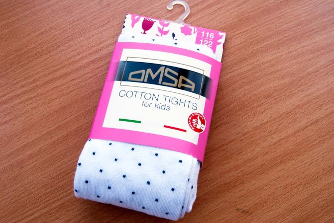 Детские белые колготки в чёрный горошек Omsa Kids 12P31-2 ©bracatus.com